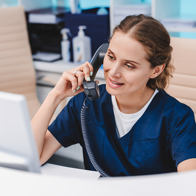 Female nurse on the phone while